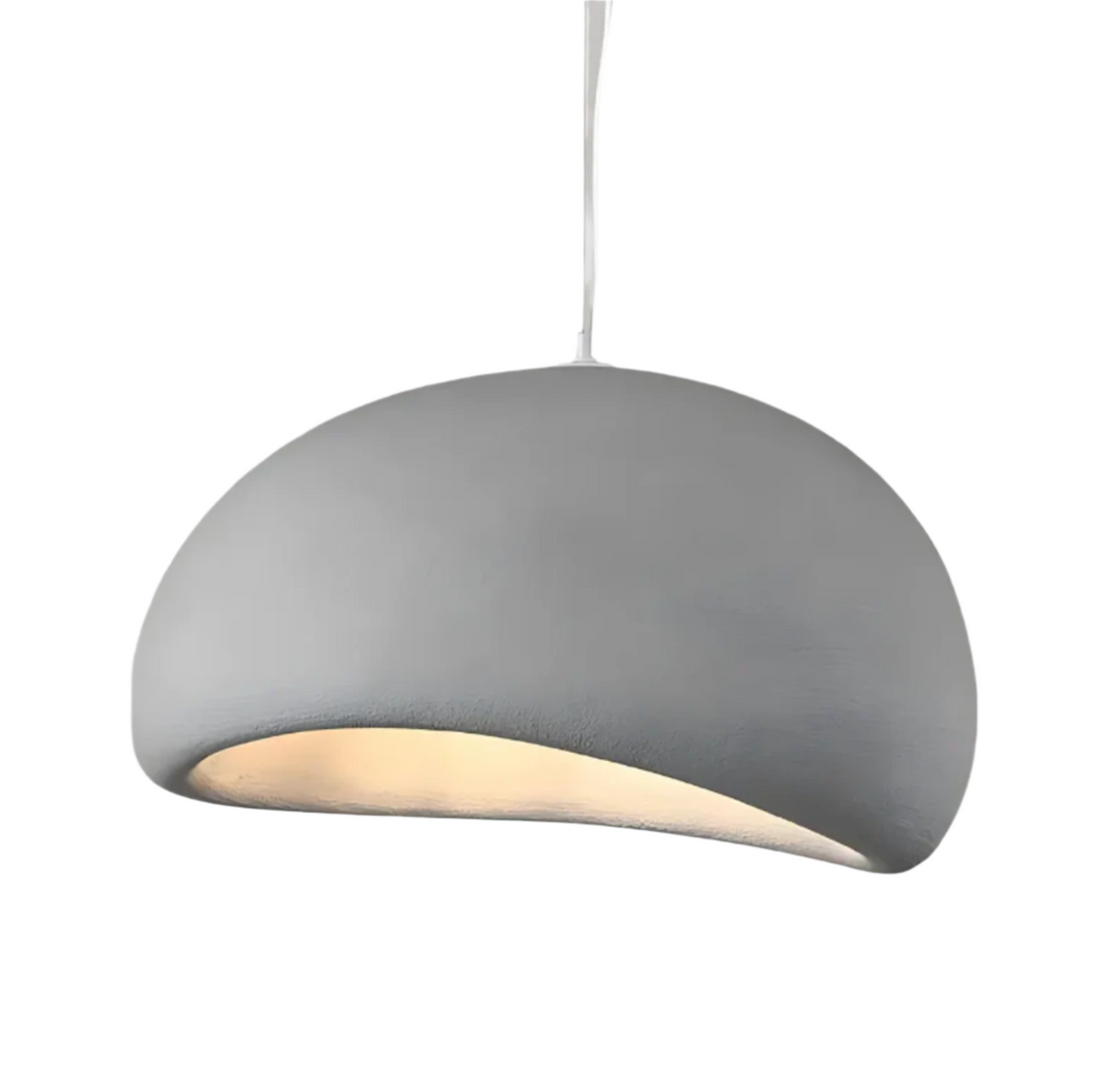 White wabi sabi dome pendant seen from the side on white