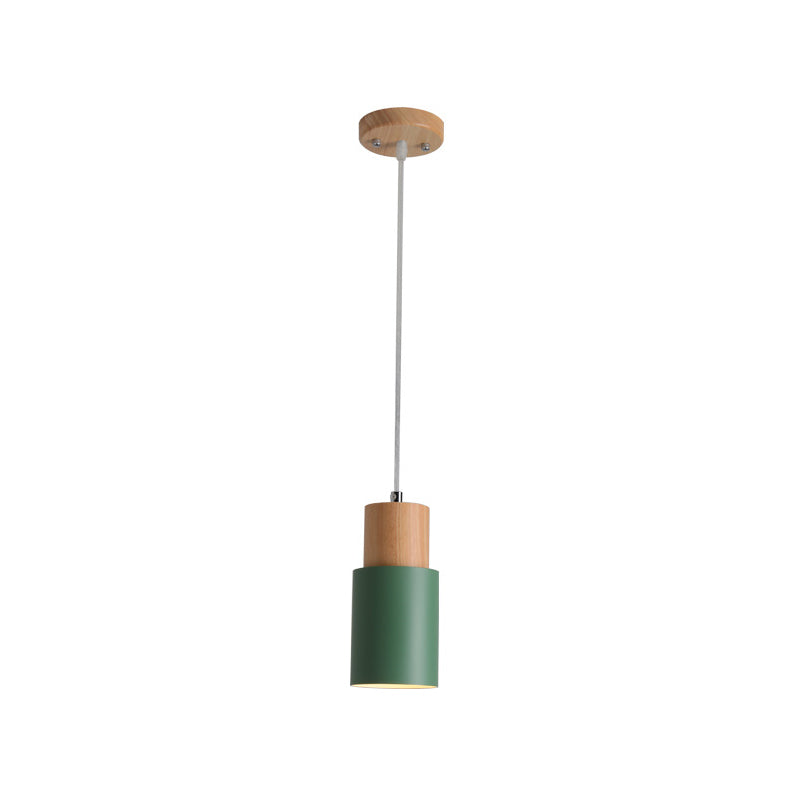 Studio shot of the green cylinder pendant on a plain backdrop