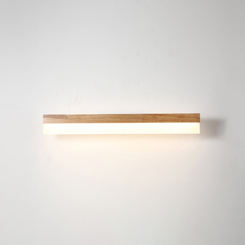 Straight wood and acrylic vanity light shown lit from the front
