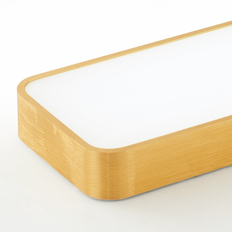 Close view of the rounded gold corner and the white diffuser