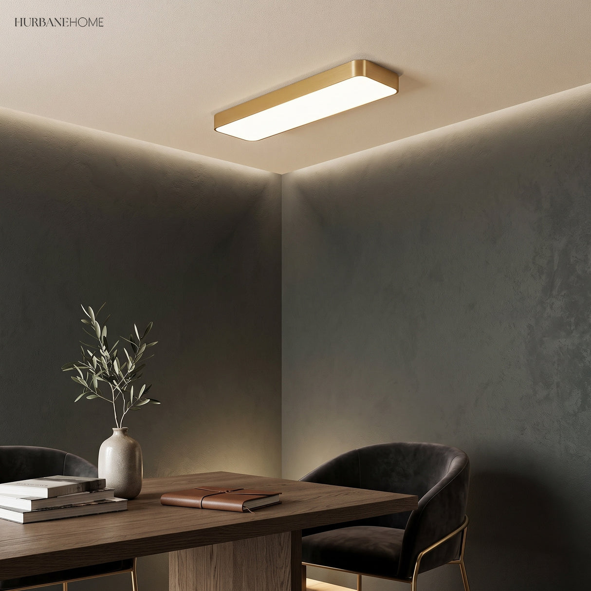 Gold LED ceiling panel lit above a desk and a black chair