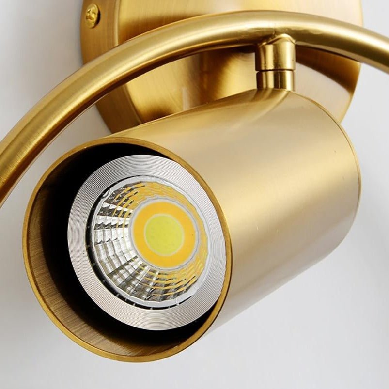 Close view of the brass spot head showing the rotating joint