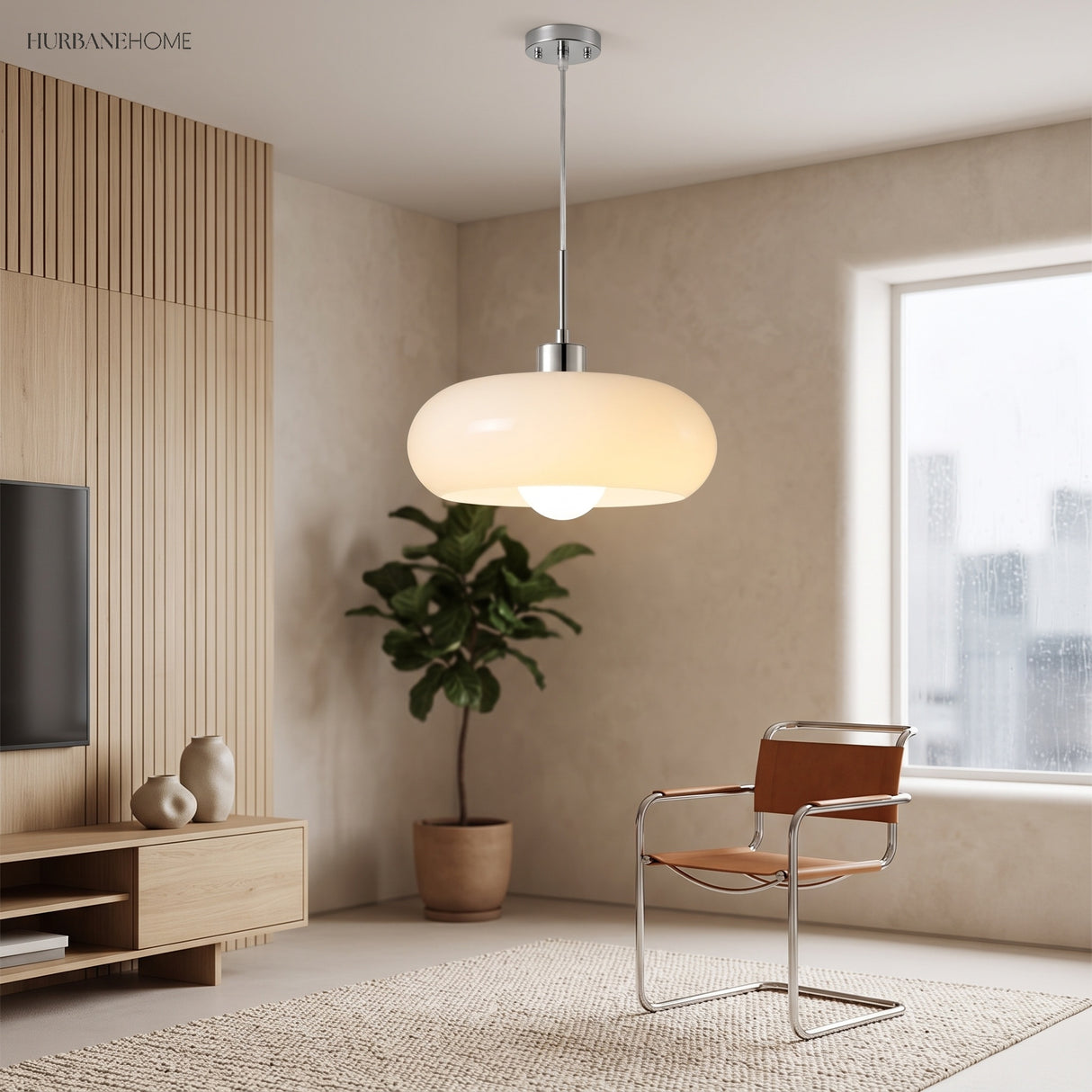 Warm orange glass pendant light casting a soft glow over a study desk