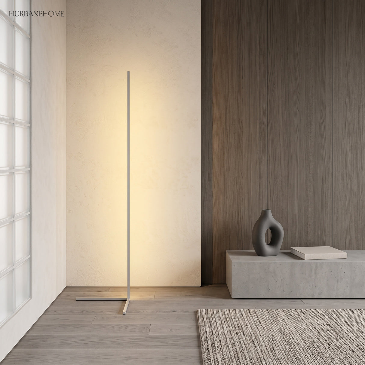 White corner floor lamp casting soft ambient light against a wood panelled wall