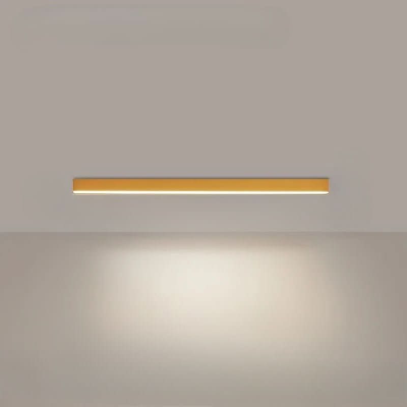 Slim aluminum linear LED ceiling light shown in a contemporary room