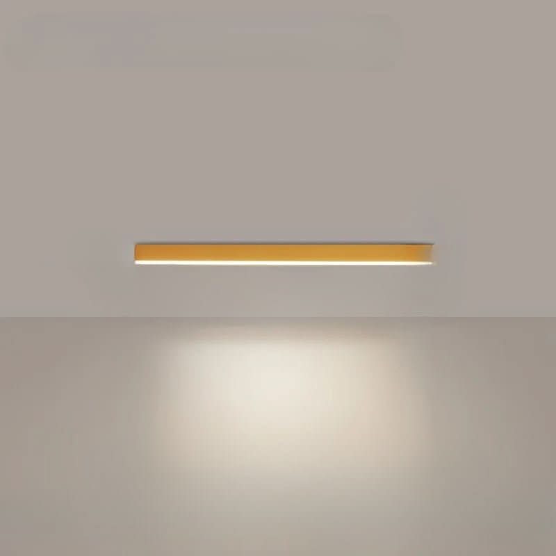 Linear LED ceiling light shown lit in a bright open plan interior