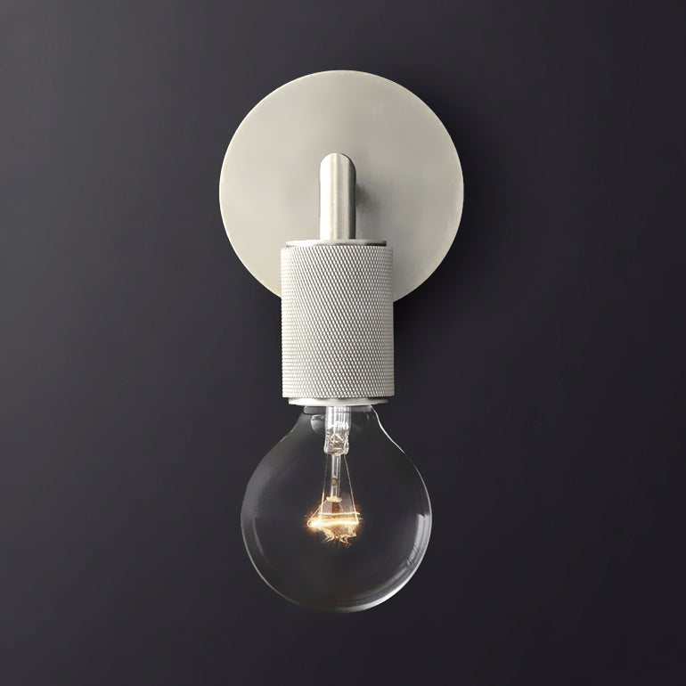 Chrome sconce with a clear globe bulb shown front on in studio