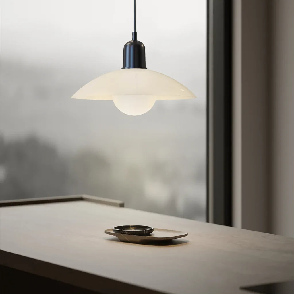 Side profile of modern dome pendant light with slim hanging cord