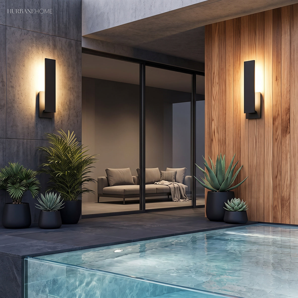Black sconce mounted on a timber clad wall by a swimming pool