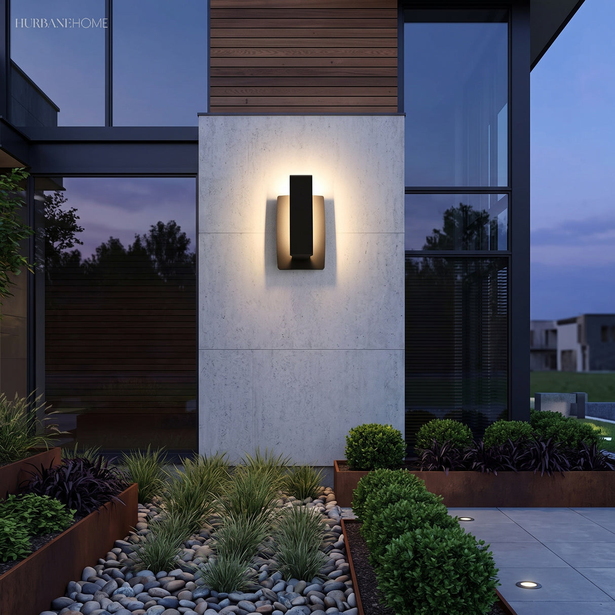 Rectangular wall sconce lighting a pale rendered column at dusk
