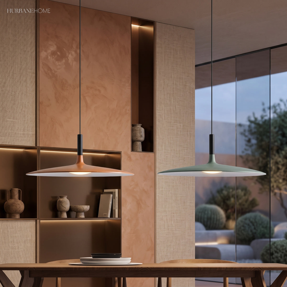 White and green saucer pendants above a timber dining table