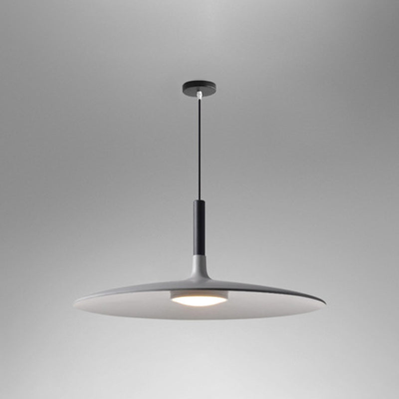 White saucer pendant shade shown wide on a grey background