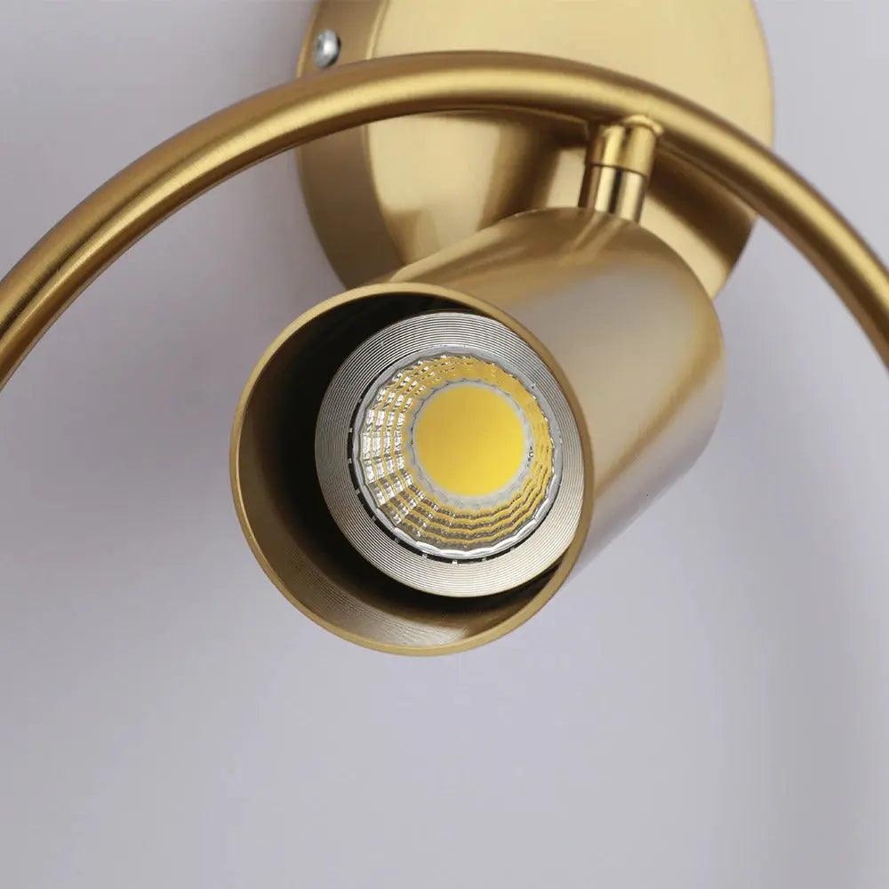 Close view of the brass cylinder head and its recessed light module