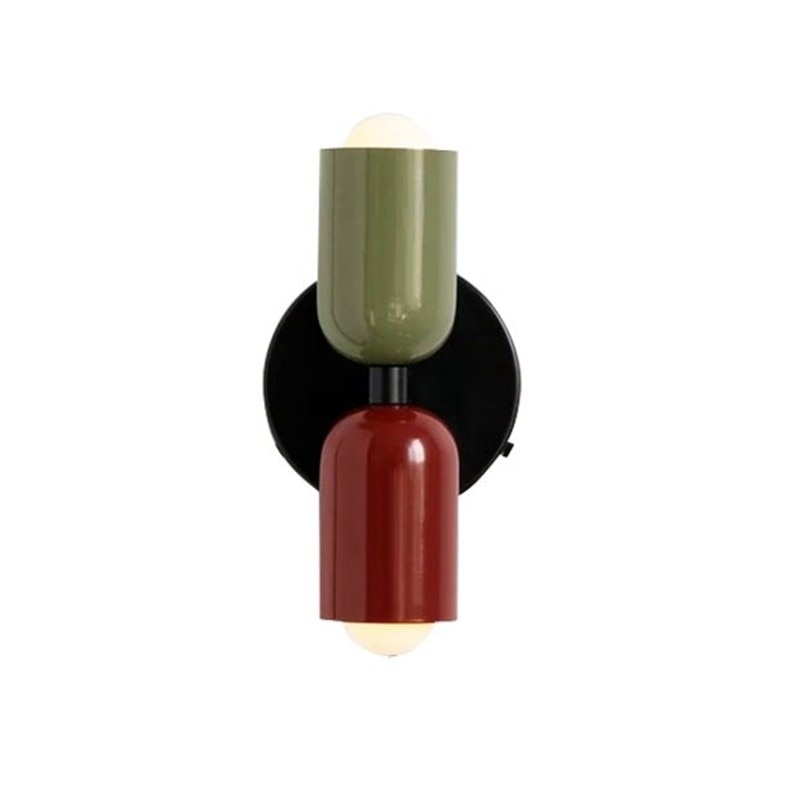 Olive and dark red cylinders lit on a black round backplate