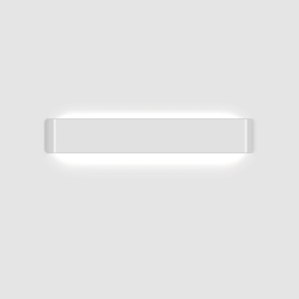 White linear wall sconce photographed alone on a grey ground