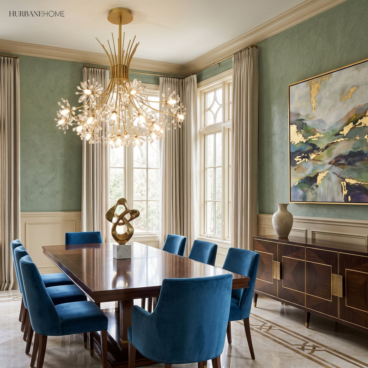 Gold dandelion chandelier in a green-walled dining room