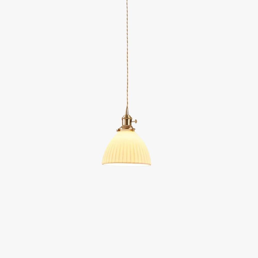 Pleated white ceramic pendant light with a brass lamp fitting, view 1