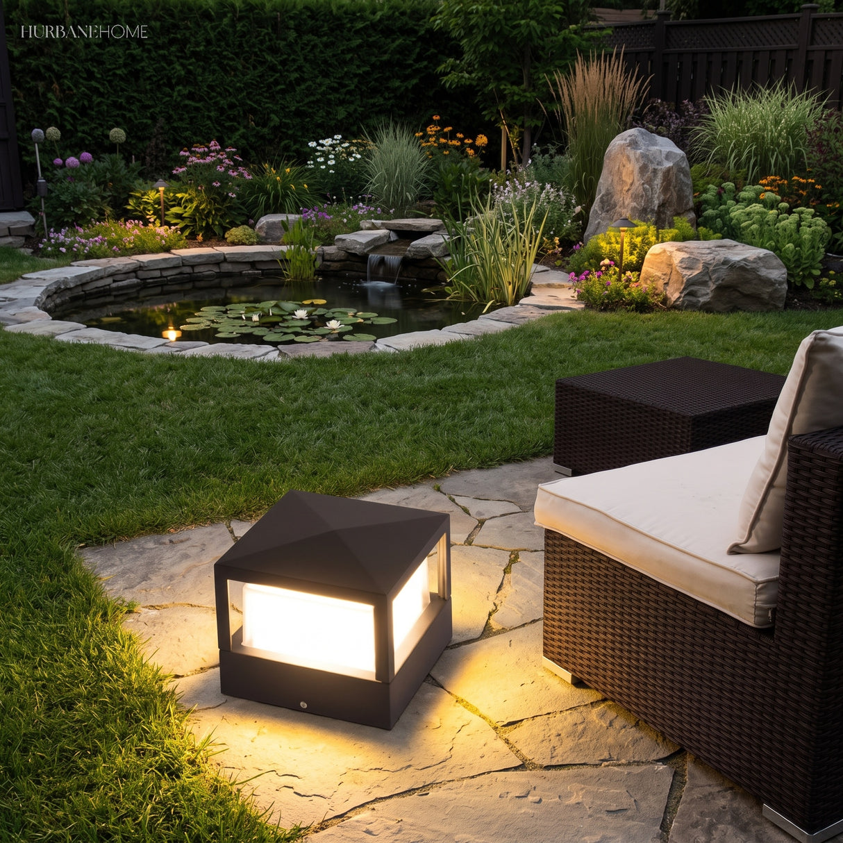Aluminium post cap outdoor landscape light in a garden setting