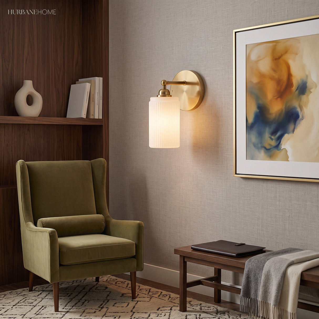 Brass ribbed glass wall light above a teak bench and abstract artwork