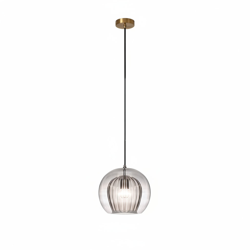 Row of three ribbed glass globes with brass fittings over a long dining table