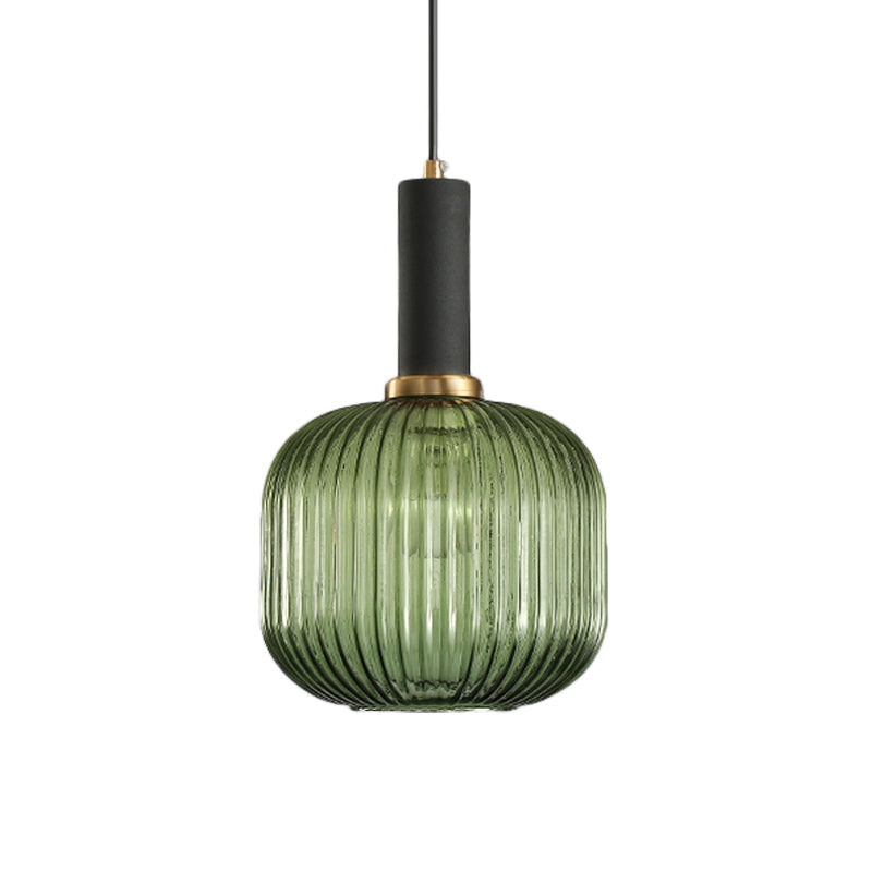 Green ribbed cylinder pendant with a black collar on white