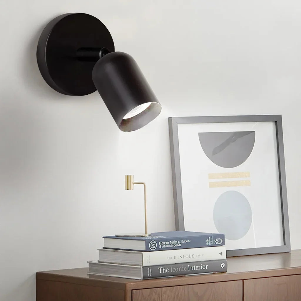 Overhead angle of the rotatable spotlight sconce and its round base