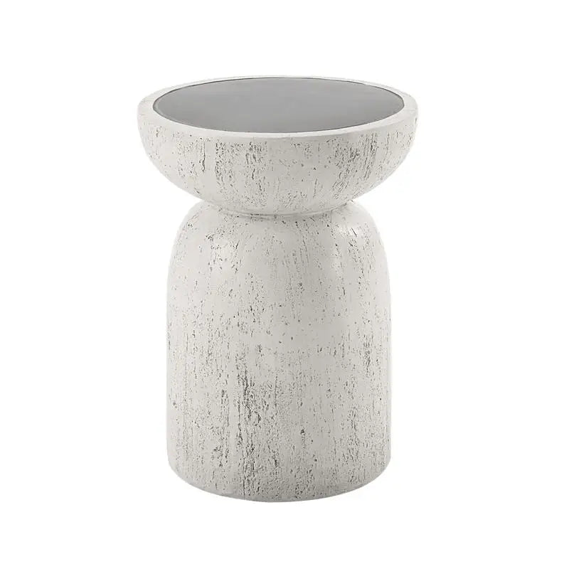 Round side table with gray concrete finish for modern living room