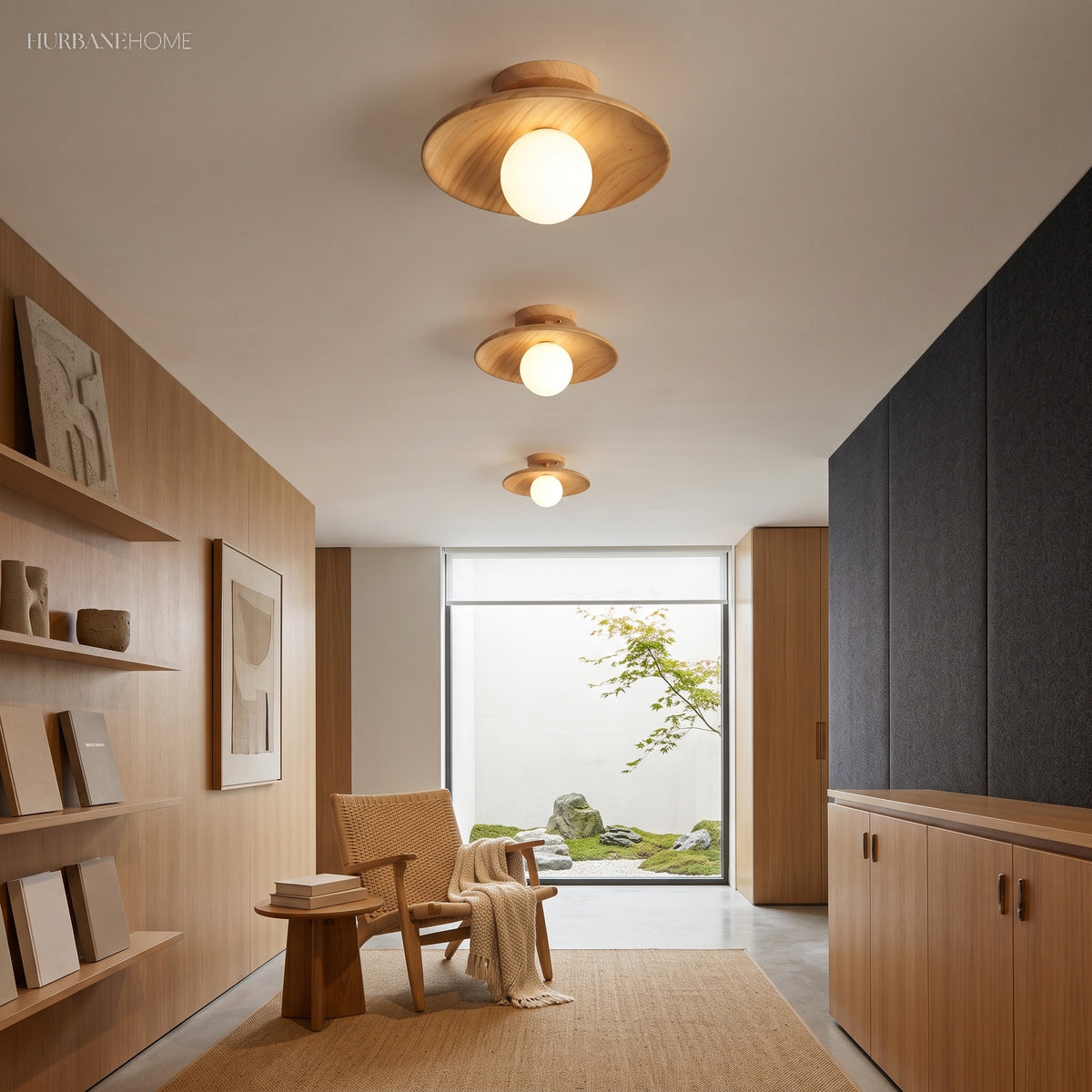 Wood semi flush lights lit above a hallway lined with shelving