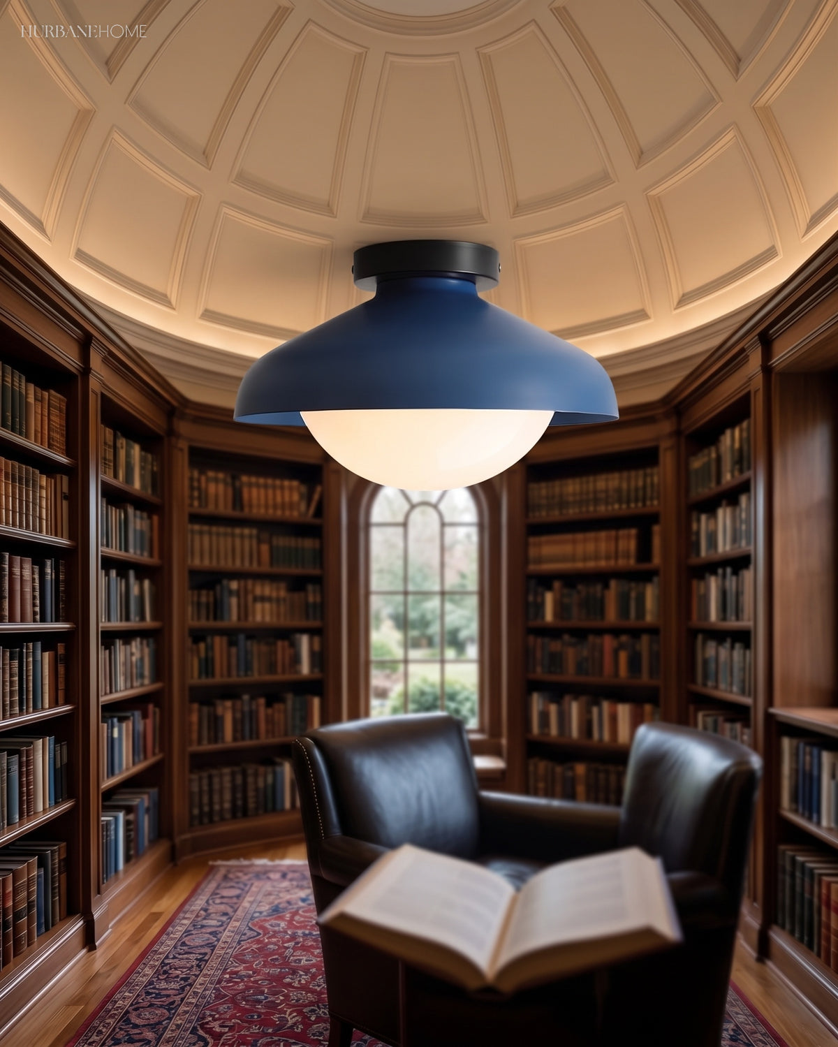Blue dome ceiling light lit beneath the domed ceiling of a panelled library