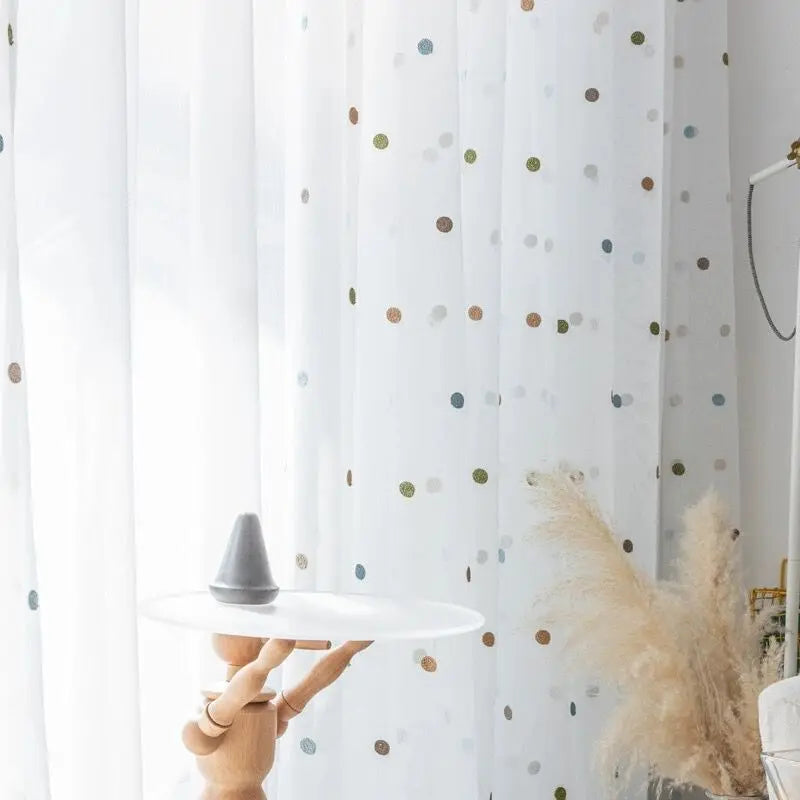 Sheer voile curtain pannel with embroidered dot detailing