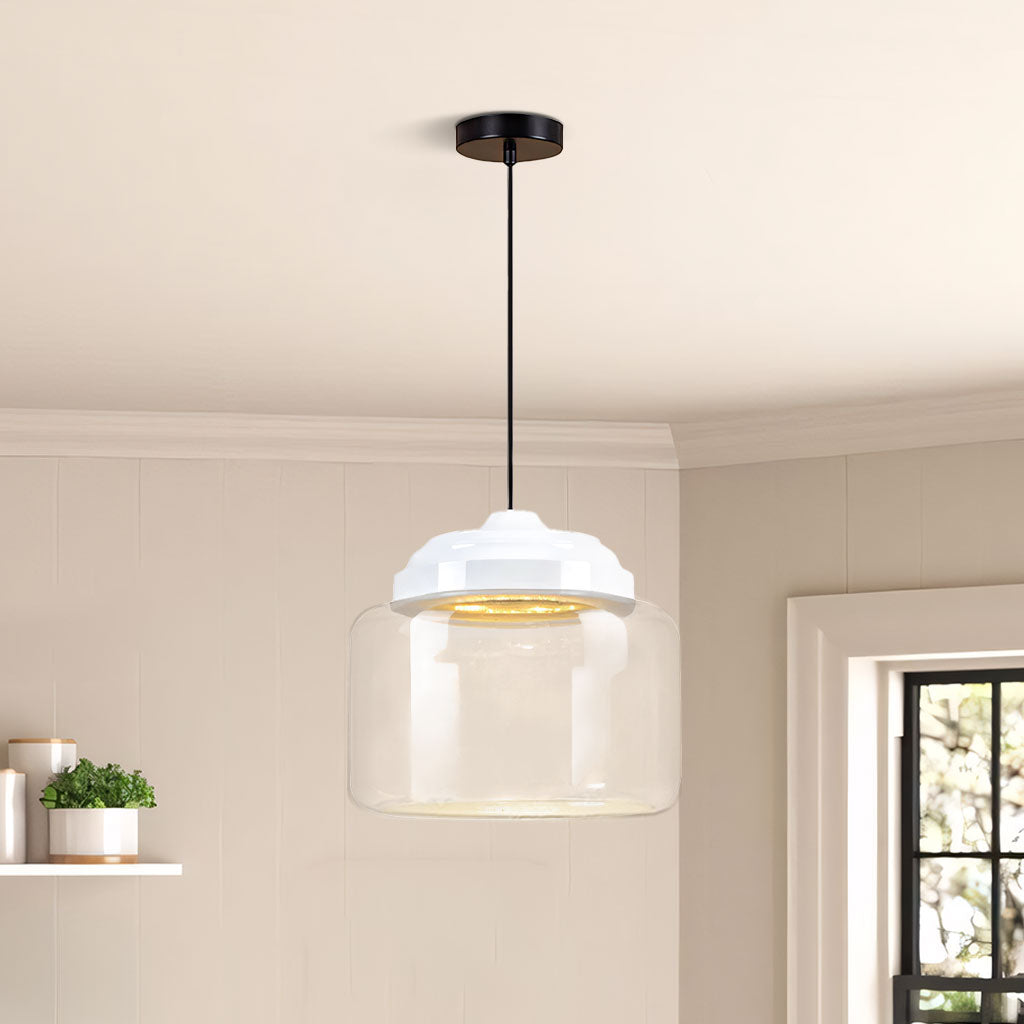 Clear glass drum pendant with white stepped cap and no figures on panelled wall