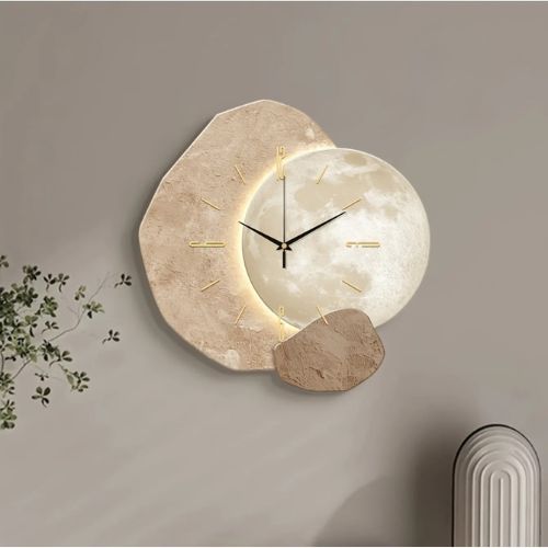 Soundless wall clock featuring elegant moon dial