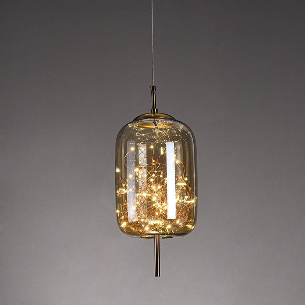 Amber glass pendant with a brass rod and dense starry LED filaments inside