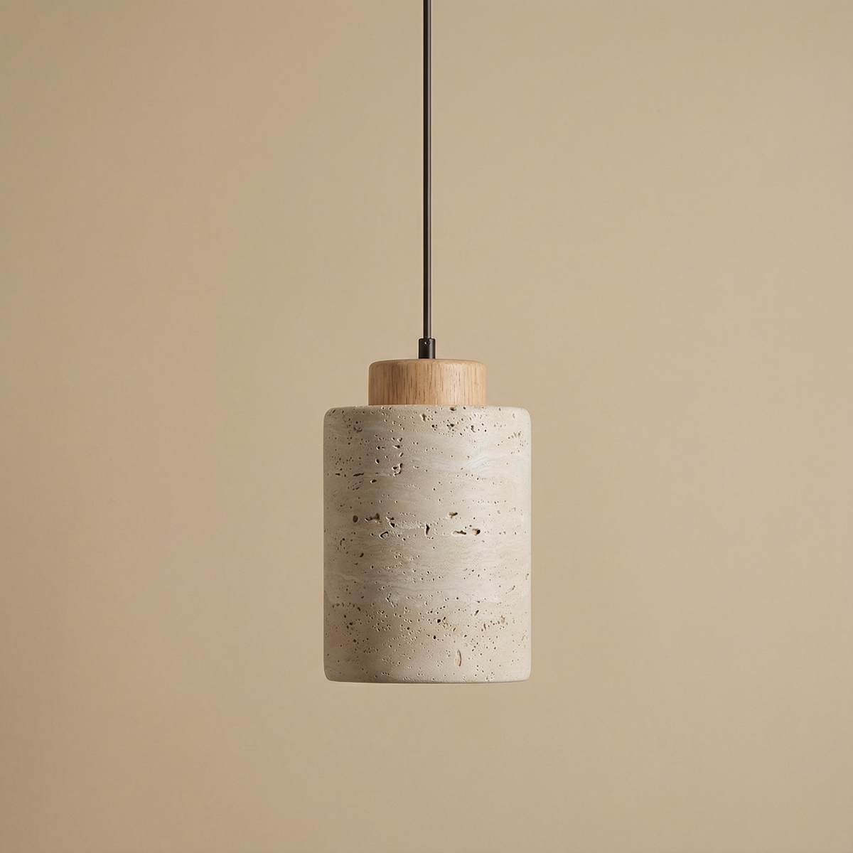 Stone pendant with a light oak cap on a warm beige background