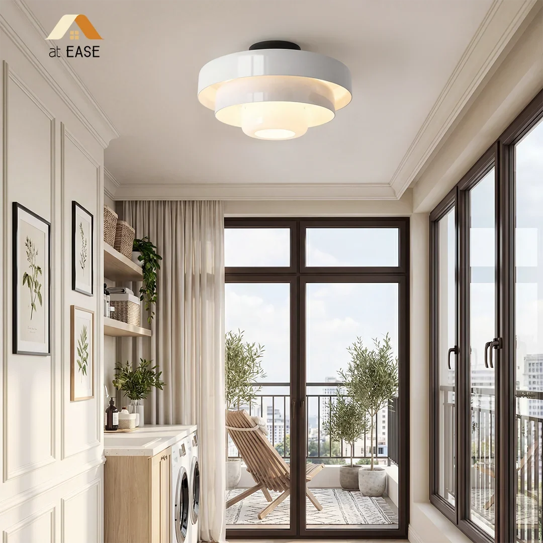 Sage green tiered ceiling light shown against a plain white background