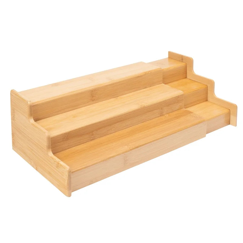 Tiered spice drawer organizer showing stepped shelf design