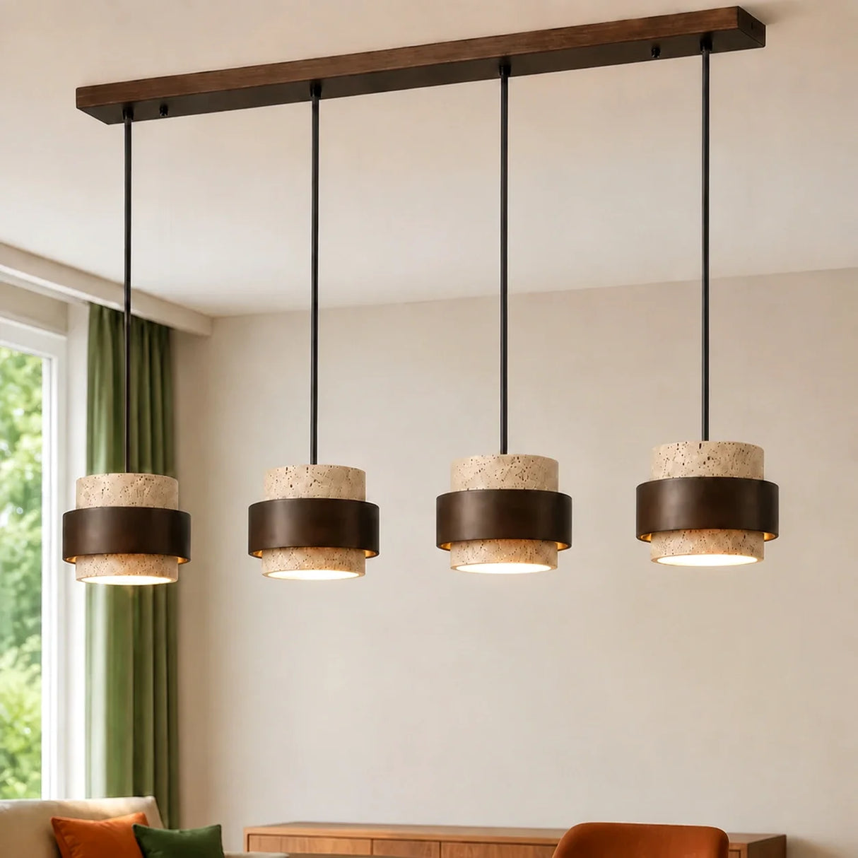 Beige travertine pendant light, four heads, over a living room seating area