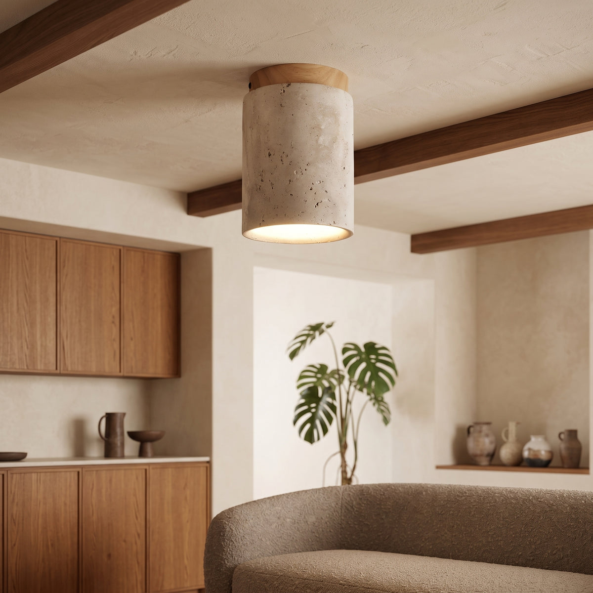 Travertine semi flush ceiling light with wood collar above a kitchen