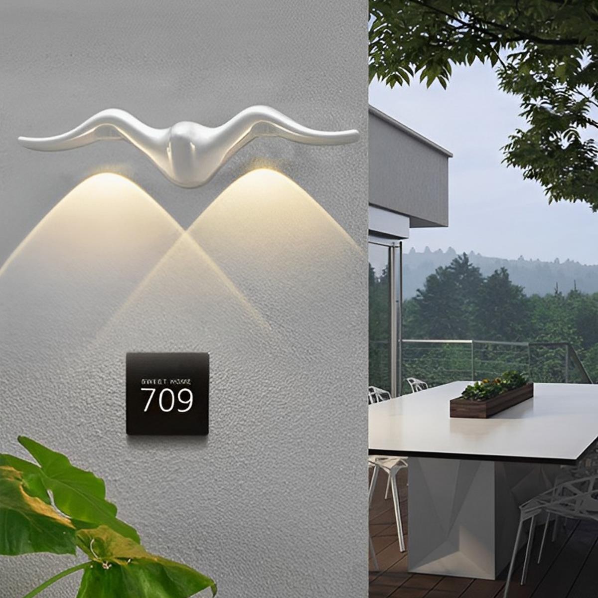 Animal shaped outdoor LED wall light detail view 4 showing finish and construction