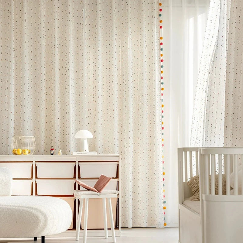 Window lace curtains featuring playful tassel accents