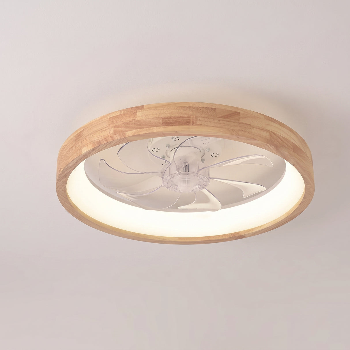 Round solid wood flush mount ceiling fan light on a plain wall