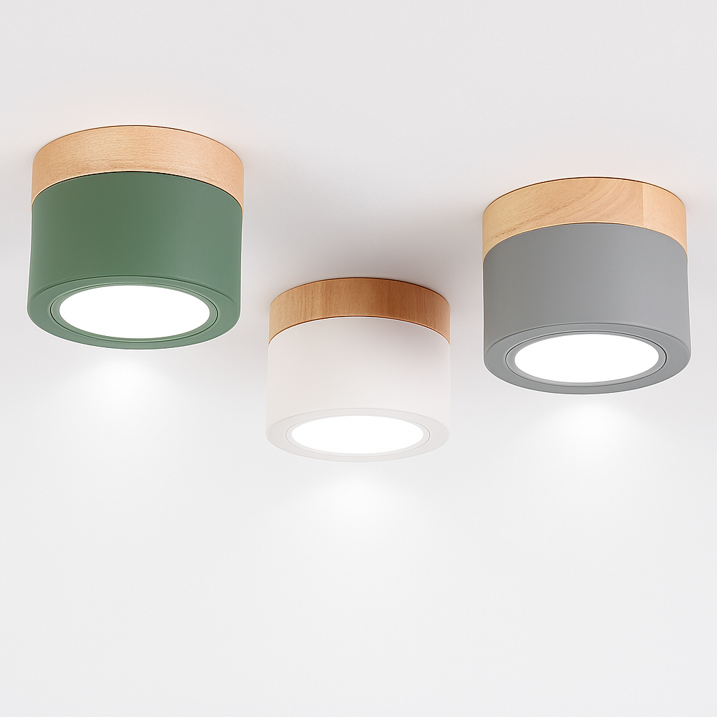 Green, cream and grey ceiling lights shown lit on white
