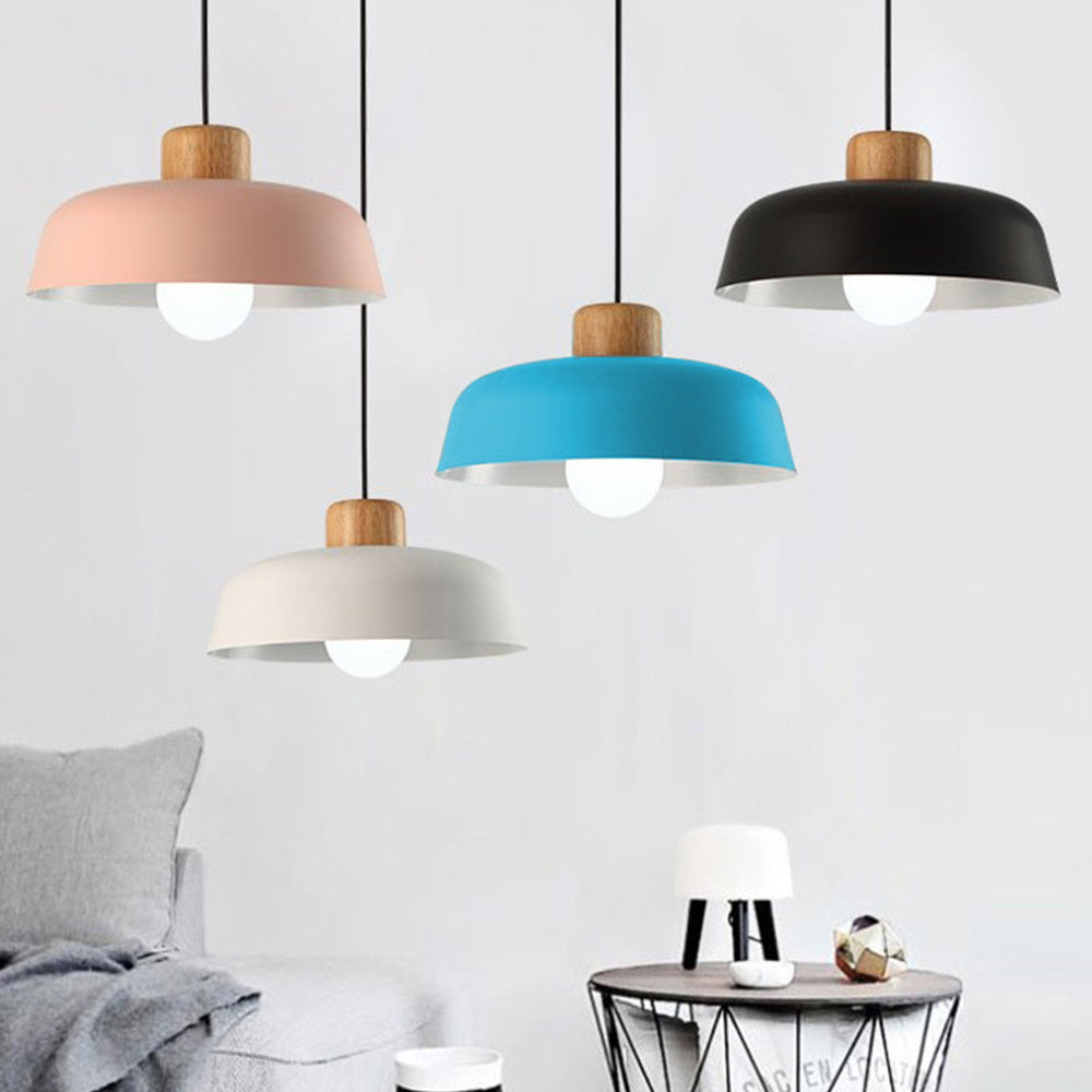 Modern wood dome pendant light shown against a plain backdrop