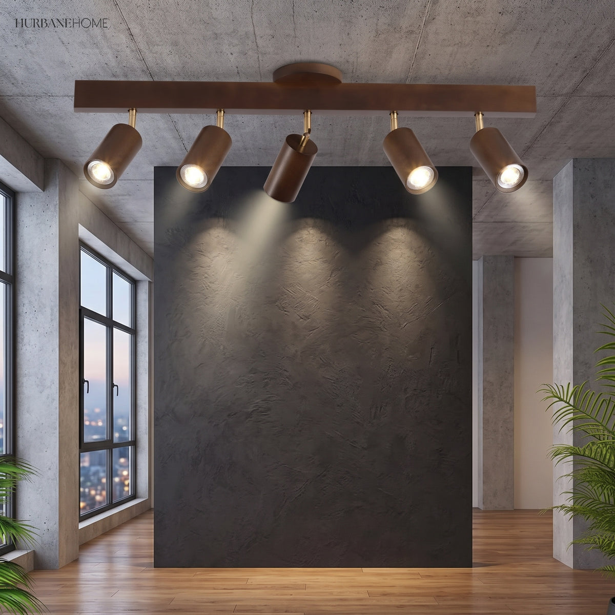 Walnut track lighting bar lighting a dark feature wall in a loft