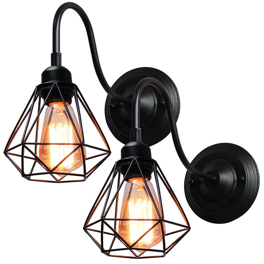 Two piece wrought iron wall sconces set with matching gooseneck design