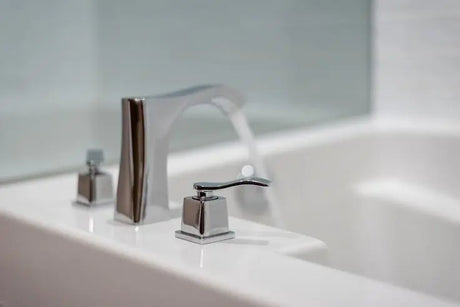 Bathroom hot and cold water tap with modern kitchen and bath fixtures suitable for sinks and laundry areas.