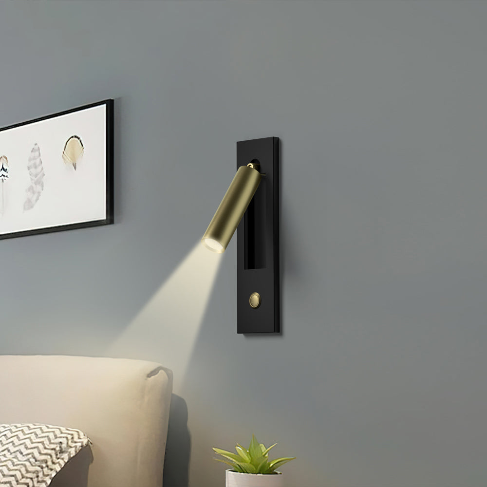 Push-button switch detail on the reading sconce backplate