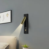 Push-button switch detail on the reading sconce backplate