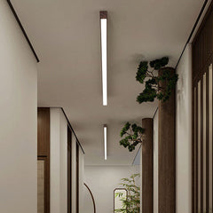 Walnut finish LED ceiling light casting even ambient light below