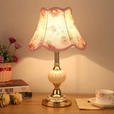 Gold fluted glass base lamp with soft pleated cream fabric shade